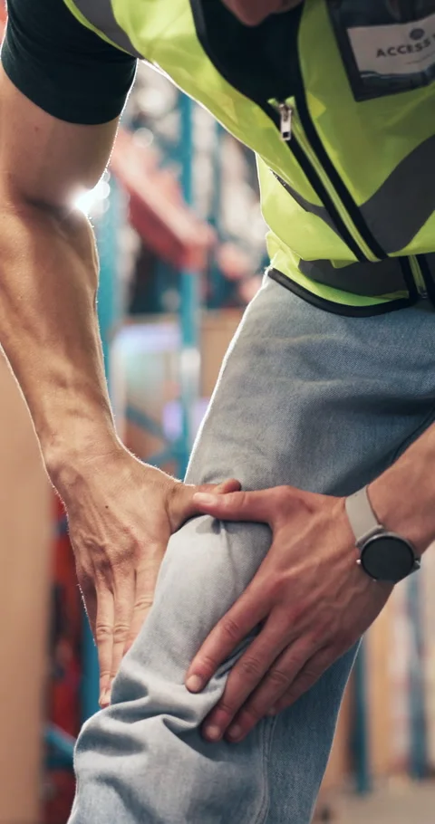 Logistics, hands and employee with knee pain, warehouse and accident at work, Stock Footage 328230867
