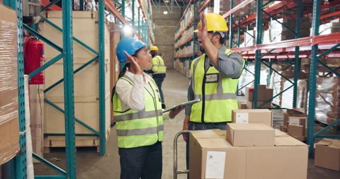 Logistics, high five and people with tablet in warehouse, teamwork and complete Stock Footage 335937260