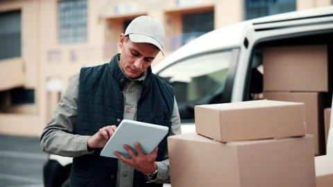 Logistics, inventory and delivery man with tablet, outdoor or checking boxes for Stock Footage 341546105