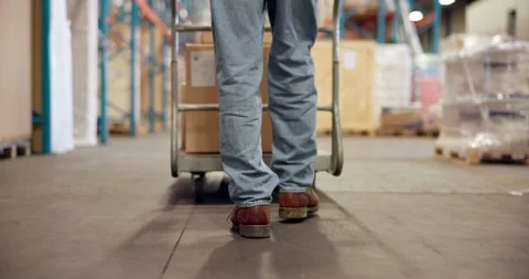 Logistics, legs of worker and trolley in warehouse to transport boxes, order Stock Footage 318506488