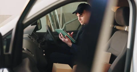 Logistics, man and boxes with tablet in delivery van for parcel scanning Stock Footage 341573831