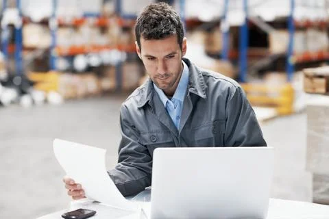 Logistics, man and document with laptop in warehouse for receiving log, customs Fotos Stock