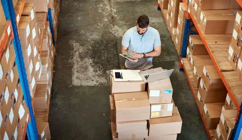 Logistics, man and scroll in warehouse with tablet, track overseas shipping.. Stock-Fotos