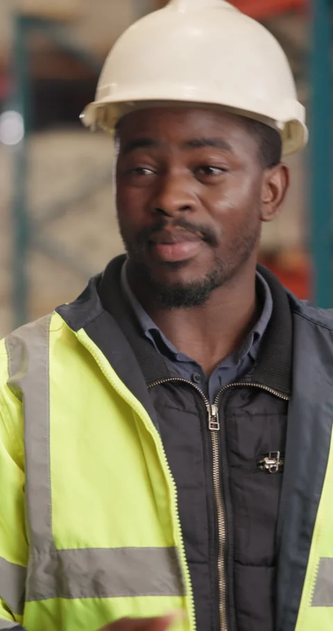 Logistics, manager and tablet with talking in warehouse, shipping schedule and Stock Footage 340961564