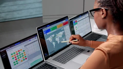 Logistics Manager Monitors Real-time Shipment Tracking Stock Footage 345852482