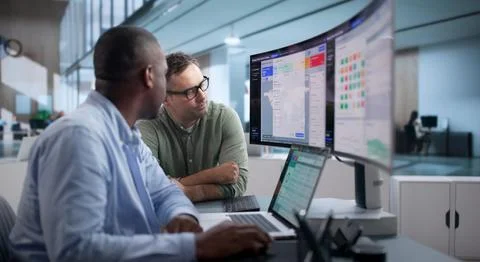 Logistics Manager Monitors Shipment Tracking Software For Real-time Delivery  写真素材
