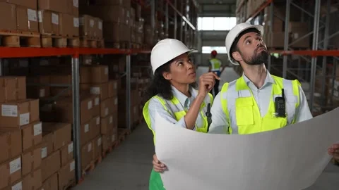 Logistics managers discussing warehouse plan Stock Footage 161947260