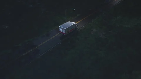 Logistics moving van driving on the roadway to transport the cardboard boxes Stock Footage 309704663