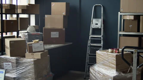 Logistics Office Workspace Showing Computers Beside Cardboard Boxes Stock Footage 337308389