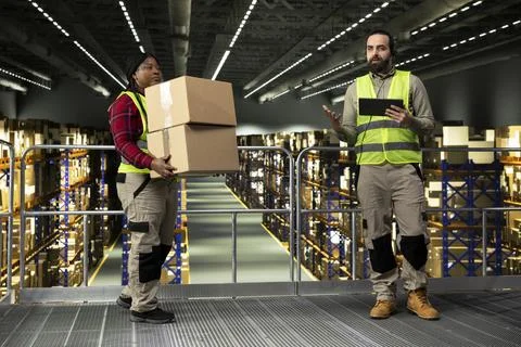 Logistics operator, assisting customers, order fulfillment, delivery tracking Stock Photos