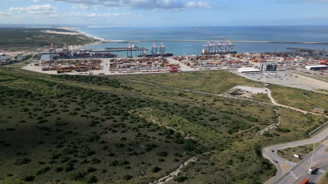 Logistics Park and Industrial Container Shipping Port beside Open Coastline Stock Footage 338112899