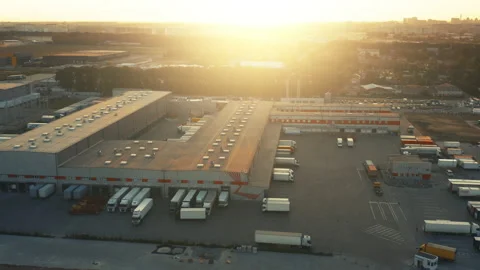 Logistics park with warehouse, loading hub. Semi-trailers trucks stand at ramps Video stock 152999526