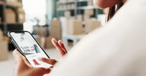Logistics, phone screen and hands in warehouse with website, sale update an.. Stock Photos
