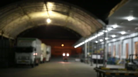 Logistics rolling clouds of warehouse at night by blurred Stock Footage 57107628