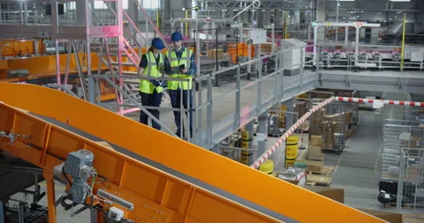 Logistics Specialists Using Tablet in Sorting Center Video stock 319005953