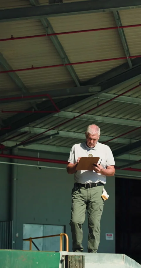 Logistics, supervisor and people outdoor with clipboard, shipping update and Stock Footage 333328057