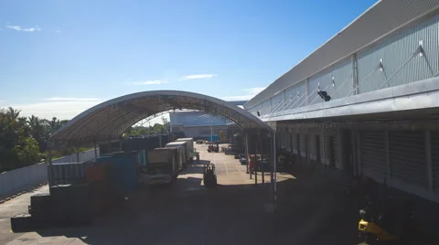 Logistics Time lapse rolling clouds of warehouse at day Stock Footage 51419109