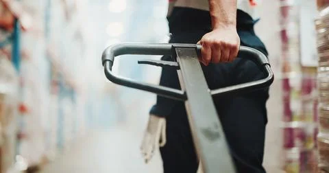 Logistics, trolley or hands of worker in warehouse, shipment import or expo.. Stock Photos