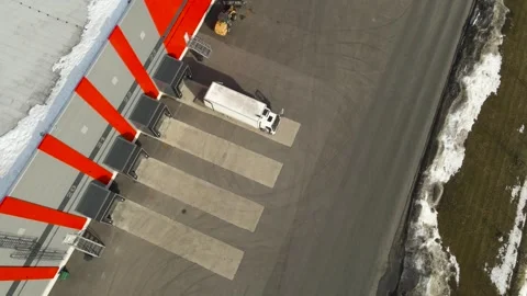 Logistics Truck Preparing for Loading at Modern Warehouse Distribution Center Stock Footage 331937815