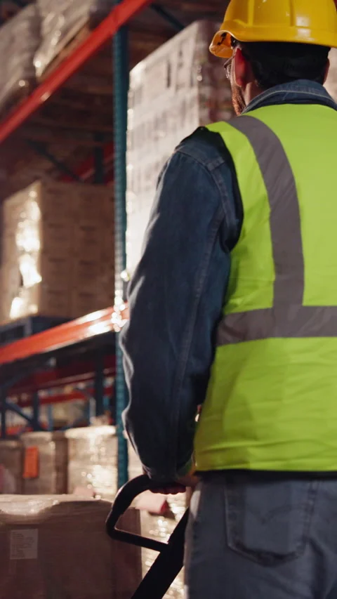 Logistics, walking and worker with trolley in warehouse, package export and Stock Footage 335864577