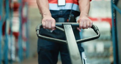 Logistics, warehouse and hands with pallet truck, loader and restock for goods Video stock 326093744