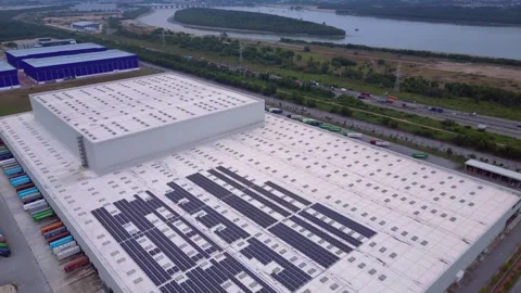 Logistics warehouse building, solar panels on roof. Nice aerial view drone Stock Footage 344595306