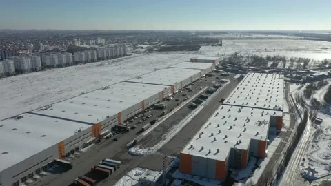 Logistics warehouse is huge. Loading trucks with goods on a ramp Stock Footage 197530638