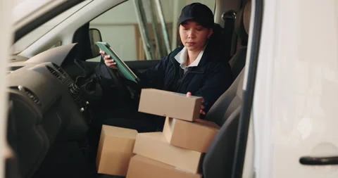 Logistics, woman and boxes with tablet in delivery van for parcel scanning Stock Footage 341589987
