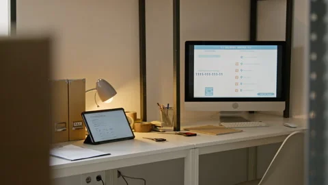 Logistics Workstation with Delivery Tracking Software on Screen Stock Footage 346048047