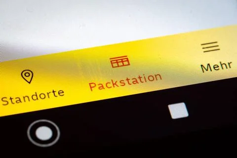  Logo of the DHL Packstation on an Android device Close-up of the logo of ... Stock Photos