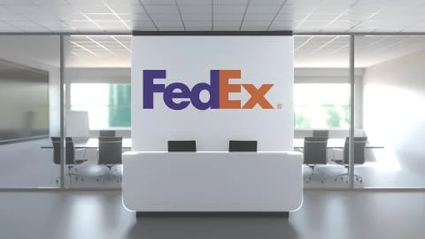 Logo of FEDEX on a wall in the modern office, editorial conceptual 3D rendering Stock Illustration