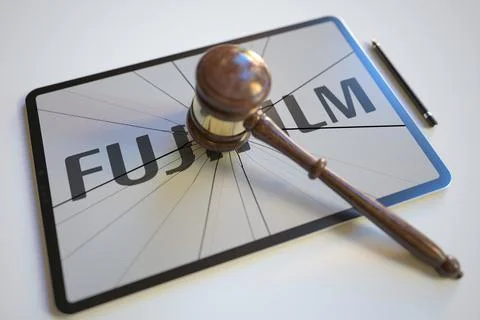 Logo of FUJIFILM on the tablet computer screen hit by judge's gavel. Court Stock Illustration