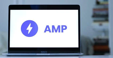 Logo of Google AMP a technology that helps web pages load faster visible on a la Stock Photos