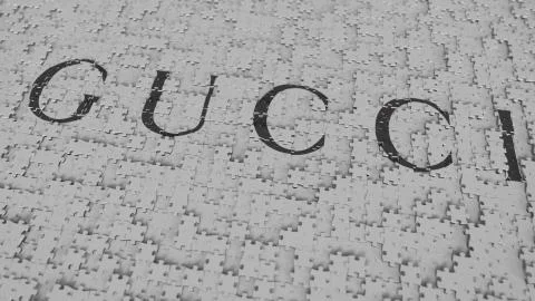 Logo of GUCCI being made with puzzle pieces, editorial 3D rendering Stock Illustration
