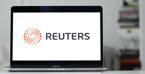 Logo of Reuters displayed on the screen of a laptop Foto stock
