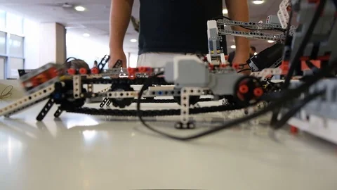 Logo robot with  slider on work line and collect items Stock Footage 113084517