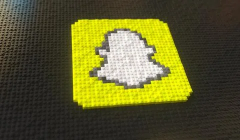 Logo of SNAPCHAT made with plastic toy blocks, editorial conceptual 3d rendering Illustrazione stock