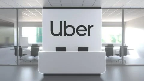 Logo of UBER on a wall in the modern office, editorial conceptual 3D rendering Ilustración de archivo
