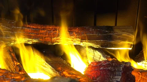 Logs are burning with a bright flame Stock Footage 164284327