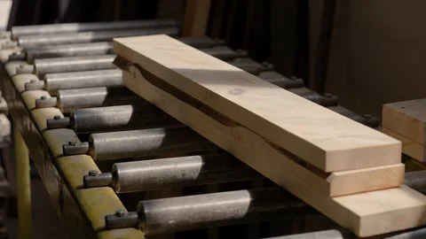 Logs are lying on the machine and are being prepared for cleaning. Видео 296042730