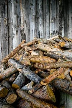Logs on the background of a barn Stock Photos