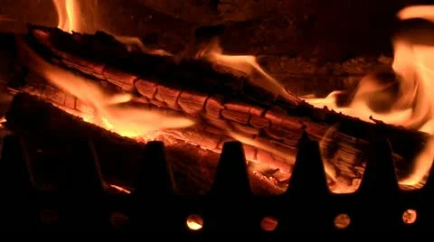 Logs burning on a fire Video stock 12700756