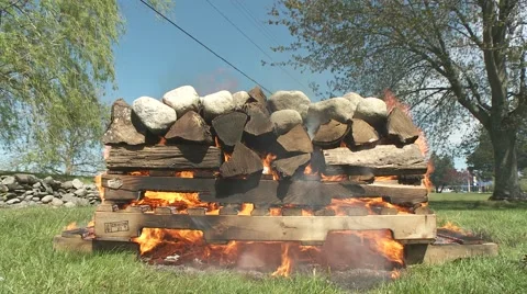 Logs burning in a fire Stock Footage 64220862