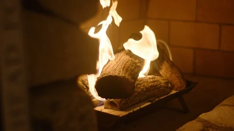 Logs burning in a fire place Stock Footage 106595184