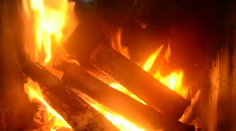Logs burning in iron-cast fireplace Stock Footage 44232152