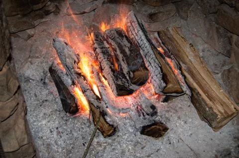 Logs on a fire Stock Photos