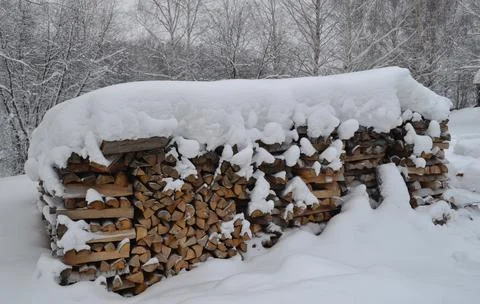 Logs under the snow Stock Photos