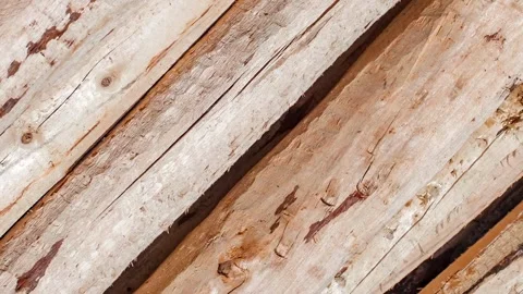 Logs of wood round, hewn, processed, stacked, rotating, turning, close-up m.. 스톡 동영상 256324133