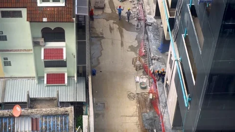 Loking down on construction workers on construction site Stock Footage 82068193