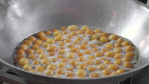 Lokma balls being deep fried making, sweet pastry Stock-Footage 276108316